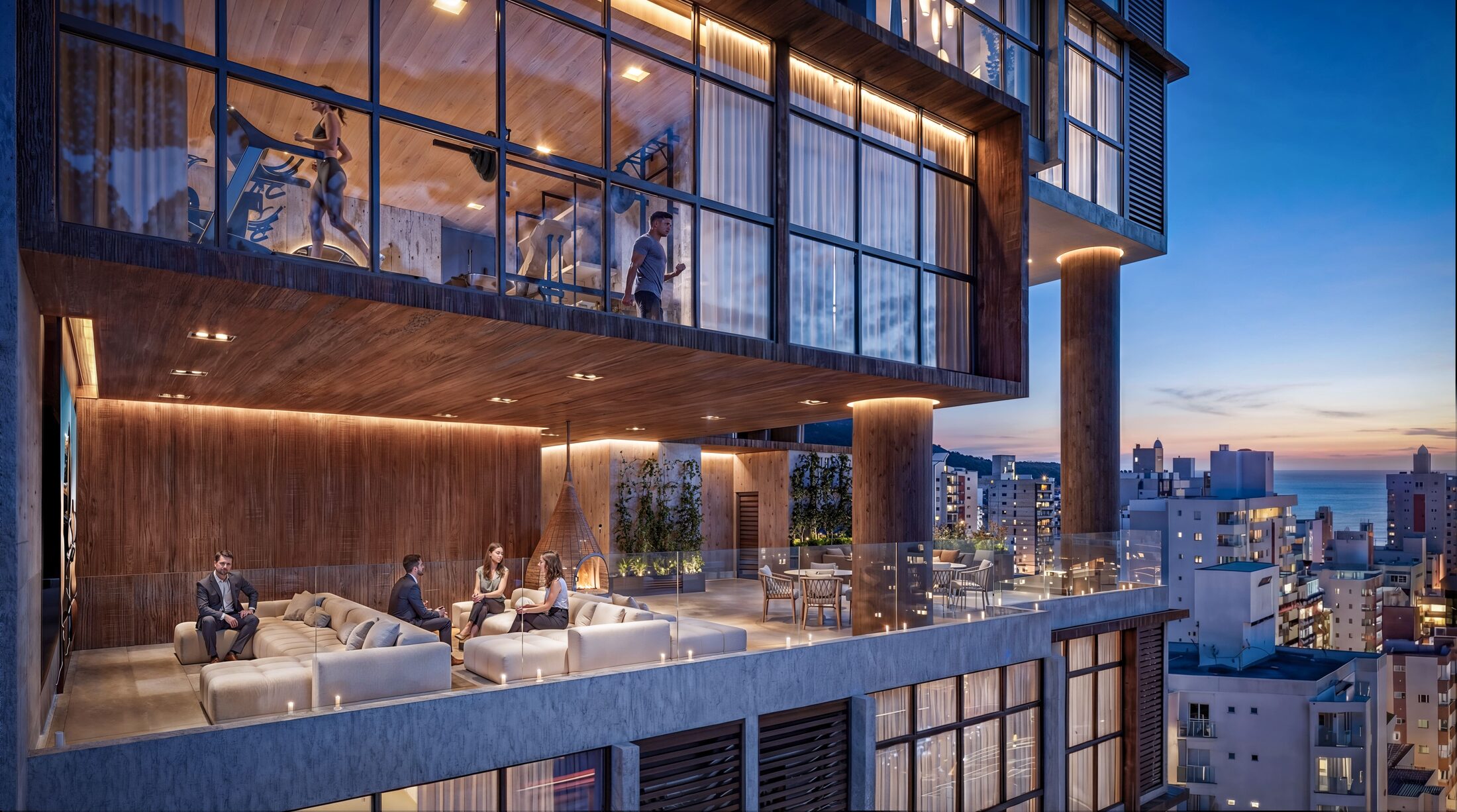 Rooftop do Lumiére ao entardecer, com lounge, academia e vista para o mar de Navegantes
